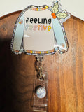 Feeling Festive Sweater Badge Reel